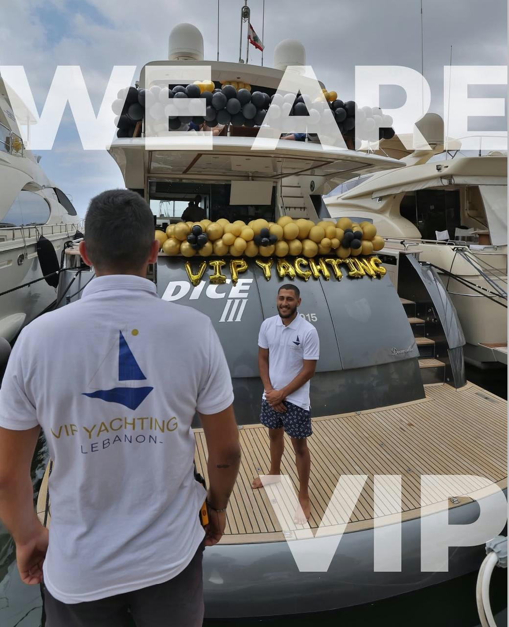 VIP Yachting Lebanon crew standing aboard yacht Dice III at the marina decorated with black and gold balloons.